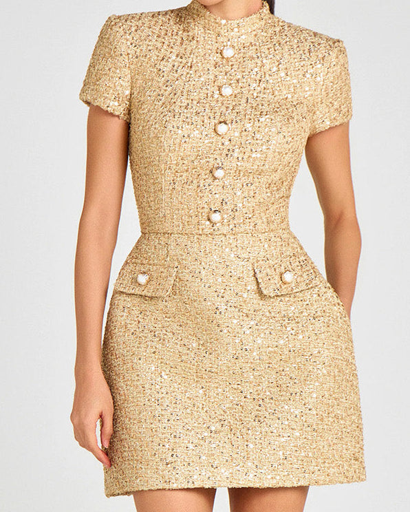 The Calypso gold bouclé mini dress in Gold